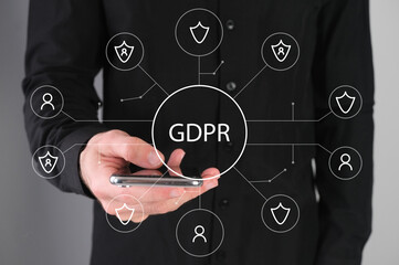 GPR concept, data protection, man with a phone in his hands.