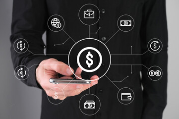 Currency exchange concept, man with a phone in his hands.