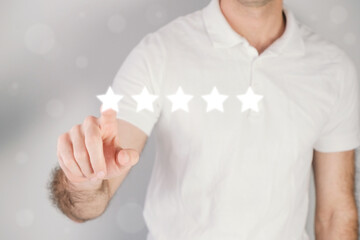 Man gives a review, five star rate, concept of giving feedback