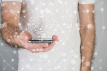 Man with a phone, browsing the internet, networking concept.