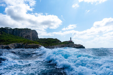 Fototapeta na wymiar Italy, Campania, Capri - 14 August 2019 - View of Capri from the rough sea