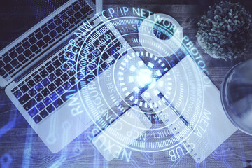 Multi exposure of data theme drawing hologram over topview work desk background with computer. Concept of technology.