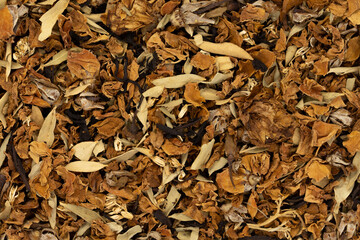Dry tea with herbs, flowers, berries as background top view