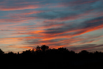 Fototapeta na wymiar Beautiful sunset, multi-colored clouds in the sky