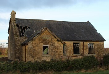 Fototapeta na wymiar Remains of a derelict schoolhouse, Brockagh National School, Glenfarne, County Leitrim, Ireland