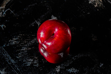 plum in a steel plate