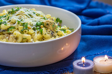 Creamy chicken pasta with mushroom and cheese.