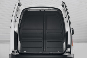 Empty van with rear doors opened
