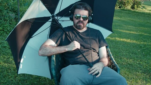 Weirdo with umbrella outside 2