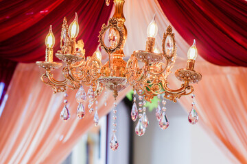 Indian Hindu wedding ceremony decorative crystal chandeliers close up