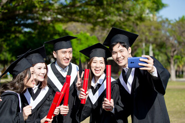 group happy graduates students