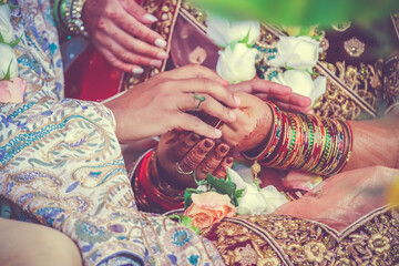 Indian Hindu wedding ceremony ritual items hands close up