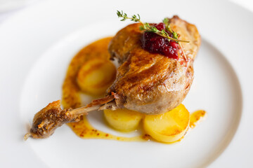roasted duck leg with potato and mustard sauce