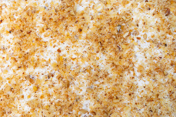 walnuts and cream cake background, close-up view