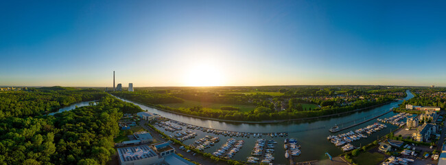 Panoramic sunset drone landscapes over the small yacht port in Luenen in Germany