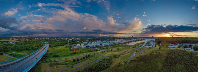 Panoramic sunset drone landscapes of Phoenix lake and highway in Dortmund
