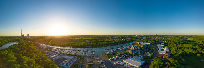 Panoramic sunset drone landscapes over the small yacht port in Luenen in Germany