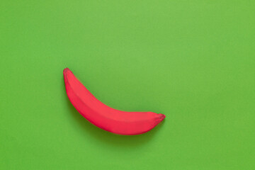pink banana on a green background, flag,