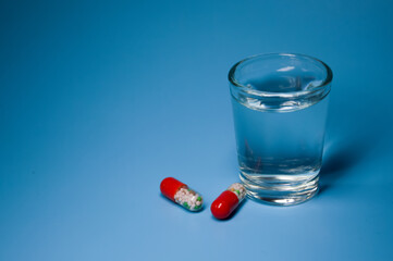 pills and glass of water