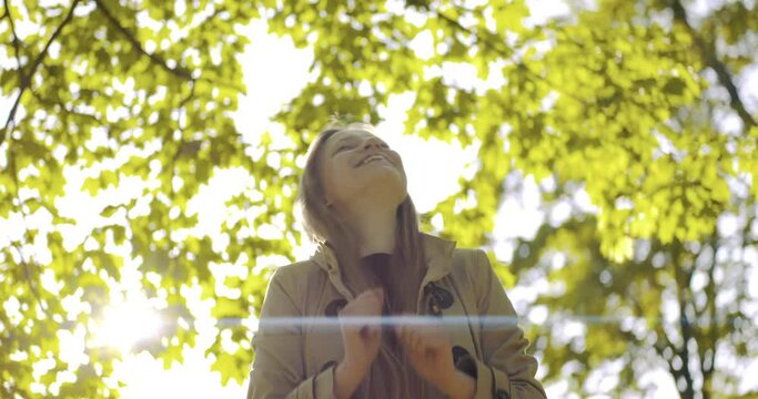 Beautiful girl full of life. Personal realization. Anamorphic lens shot. Happiness concept