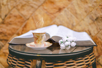 Holy Bible With Hot Tea Espresso In Modern Scene