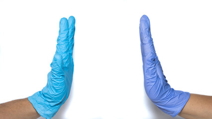 two hands with medical gloves on a white background. Concept of isolation and self-care, copy space.