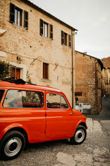 A photo of an Iconic Fiat taken while sightseeing in Montepulciano, a medieval and Renaissance hill town and comune in the Italian province of Siena in southern Tuscany.