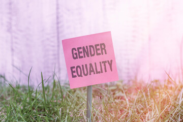 Writing note showing Gender Equality. Business concept for access to same privilege given to both...