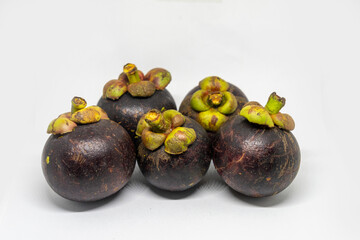 5 mangosteen isolated on a white background