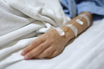 iv infusion intravenous injection of patient illness lying on bed