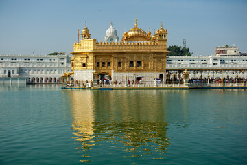 Obraz premium C-0003 Golden Temple Photographed in Amritsar, India in April 2019. Sikh shrine-Golden Temple. The most expensive temple in India built with pure gold. 