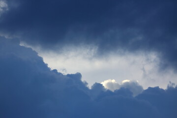 Fototapeta na wymiar sunlight through cloud on dramatic sky background