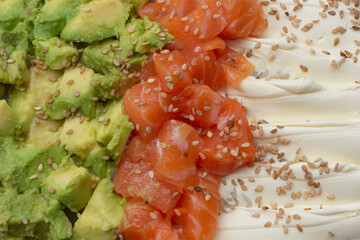 Sushi salad. Salmon, avocado, cream cheese and sesame. Fresh and healthy food. Asian fusion.
