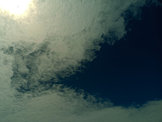 white clouds against a beautiful blue sky