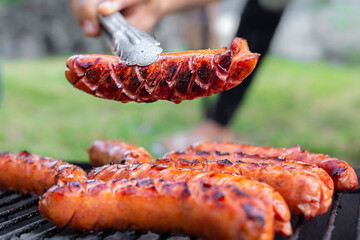 Close up of hot dogs on a grill with nice grill marks