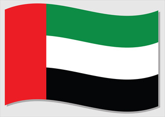 Waving flag of UAE vector graphic. Waving Emirati flag illustration. UAE country flag wavin in the wind is a symbol of freedom and independence.