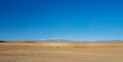 Beautiful panorama of  Atlas mountains and blue skies in Marrakech,  Morocco. 