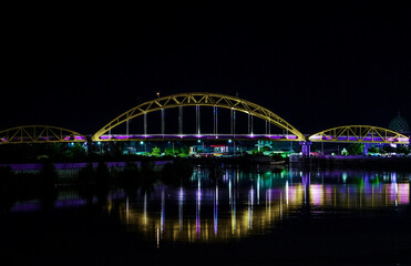Fototapeta na wymiar Bridge luminescent purple, Tanah Grogot Indonesia