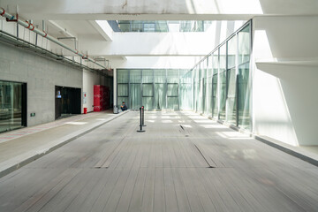 Interior space, glass windows and empty concrete floors