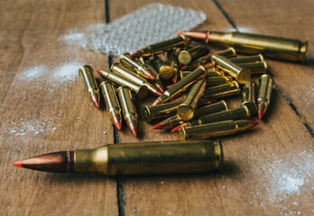 17HMR and .308 Ammunition on board surrounded by powder
