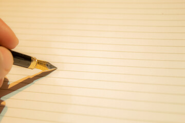 writing on a notebook