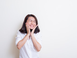 Portrait of young asian woman standing and smiling