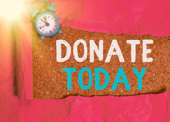 Conceptual hand writing showing Donate Today. Concept meaning to give like goods, money or time to...