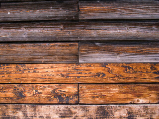 古い木の壁。自然と古くなった木製の壁。