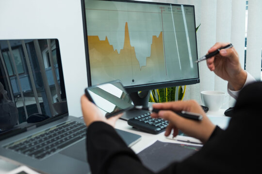 Stock surfers consult investment with online brokers, trading, trading stocks to get business profits. - Powered by Adobe