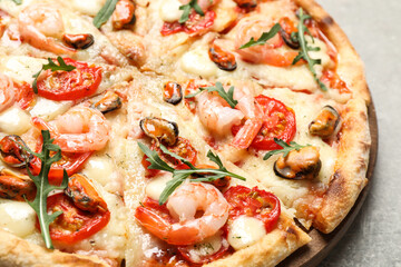 Delicious seafood pizza on table, closeup view
