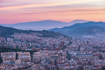 Fototapeta na wymiar Barcelona Spain, high angle view sunrise city skyline from Bunkers del Carmel