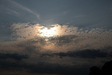 Sunset with clouds in the foreground