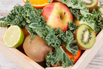 Fresh ripe fruits with vegetables. Healthy dessert containing vitamins and minerals