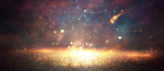 background of abstract glitter lights. gold, blue and black. de focused - obrazy, fototapety, plakaty